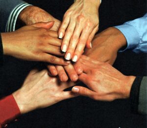 Hands working together